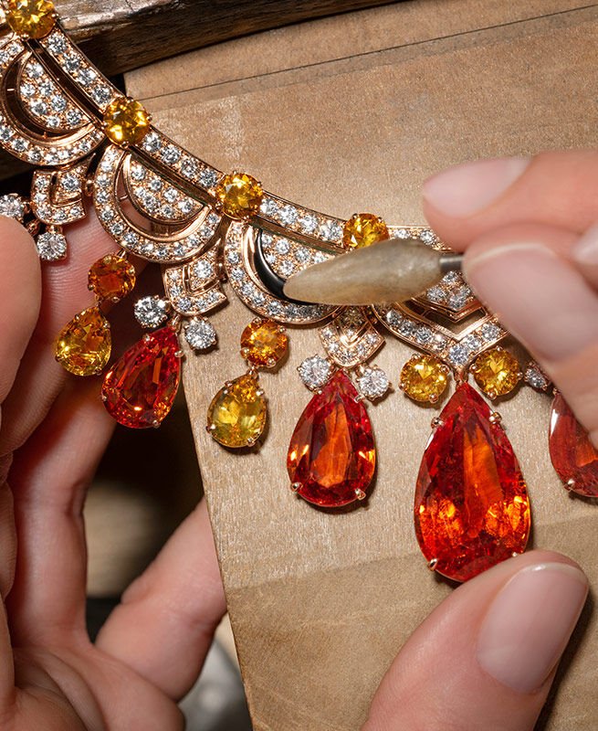 Bvlgari craftsman creating high jewelery necklace. Bvlgari craftsman creating high jewelery necklace.