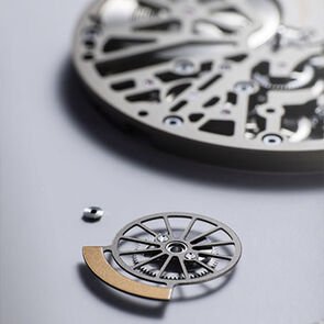 Assemblage of the black spinel-set bezel on the case of the Octo Finissimo Skeleton 8 Days watch.