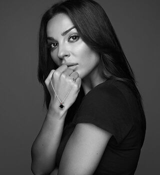 Nadin Nassib Njeim posing with Bvlgari’s Save the Children necklace for the #GiveHope campaign.
