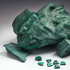 Rough malachite stone and some fan-shaped malachite elements for the Divas' Dream jewelry collection.