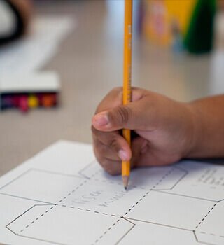 A student participating to activities of the Bvlgari and Save the Children afterschool arts curriculum Arte di Bvlgari, close up.