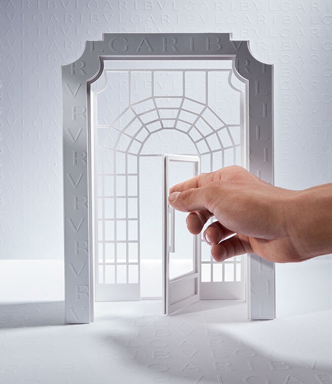 Hand opening a model of a Bulgari door to represent Bulgari's book an appointment service. Hand opening a model of a Bulgari door to represent Bulgari's book an appointment service.