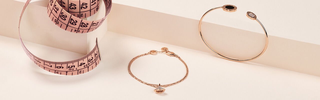 Creative shot of Divas' Dream bracelet in rose gold and diamonds and Bvlgari Bvlgari bracelet in rose gold.