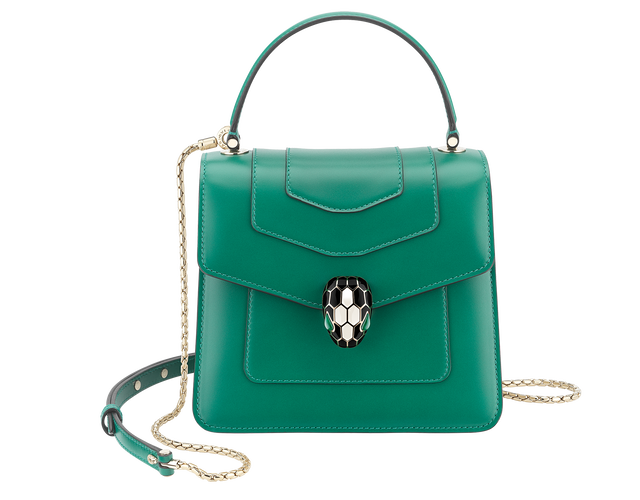 Serpenti Forever small top handle bag in emerald green calf leather with amethyst purple grosgrain lining.
